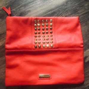 Steve Madden magnetic clutch.